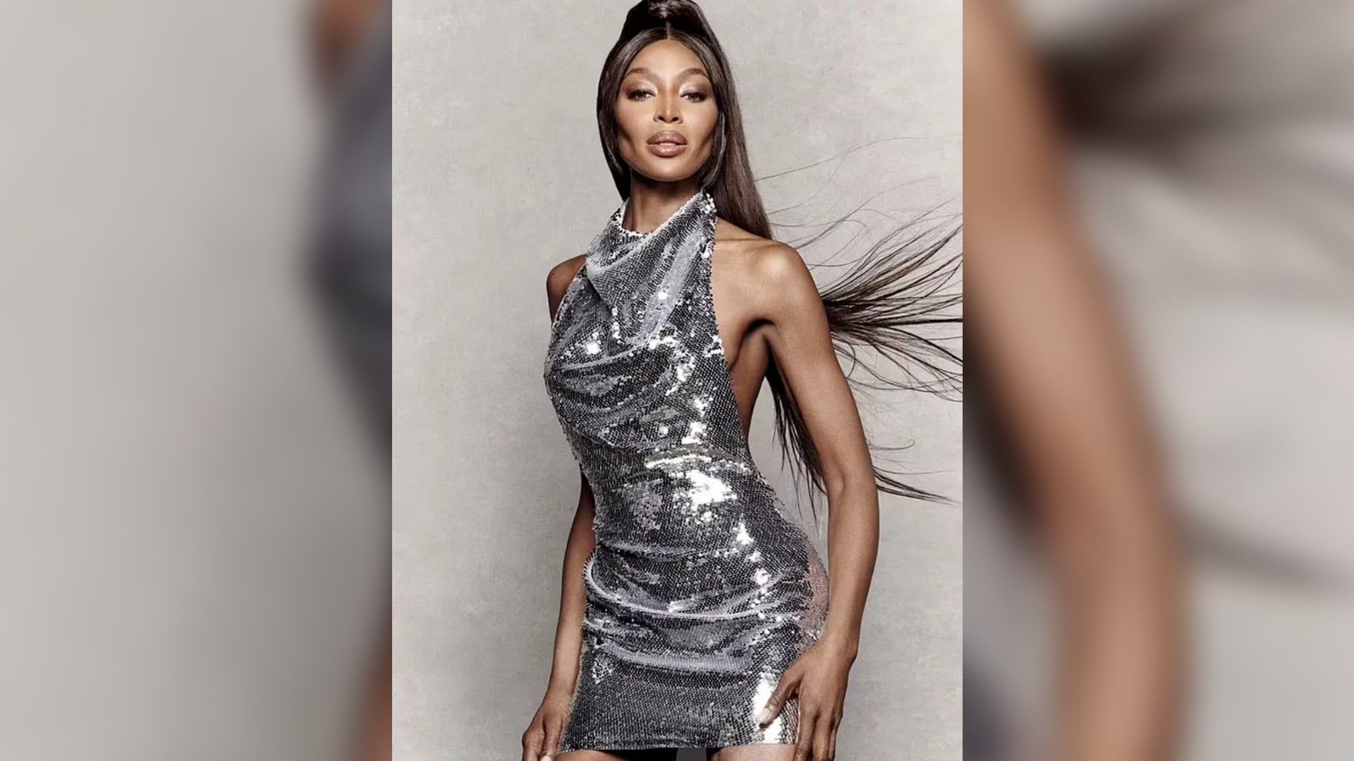 Naomi Campbell in silver dress with sequins