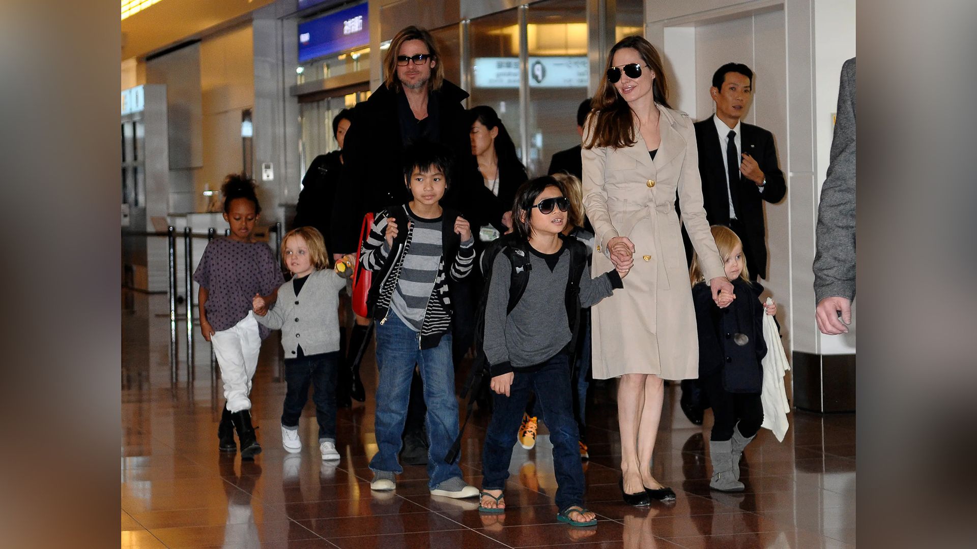 Angelina Jolie and Brad Pitt with their children