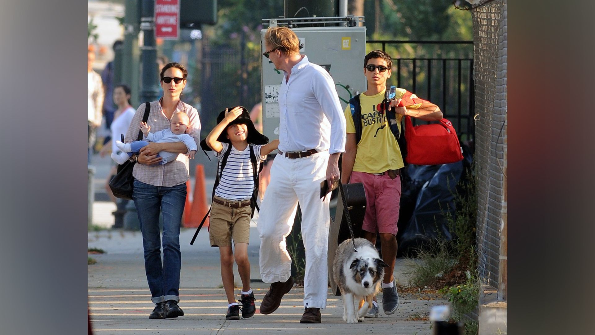 Jennifer Connelly, her husband and children are walking