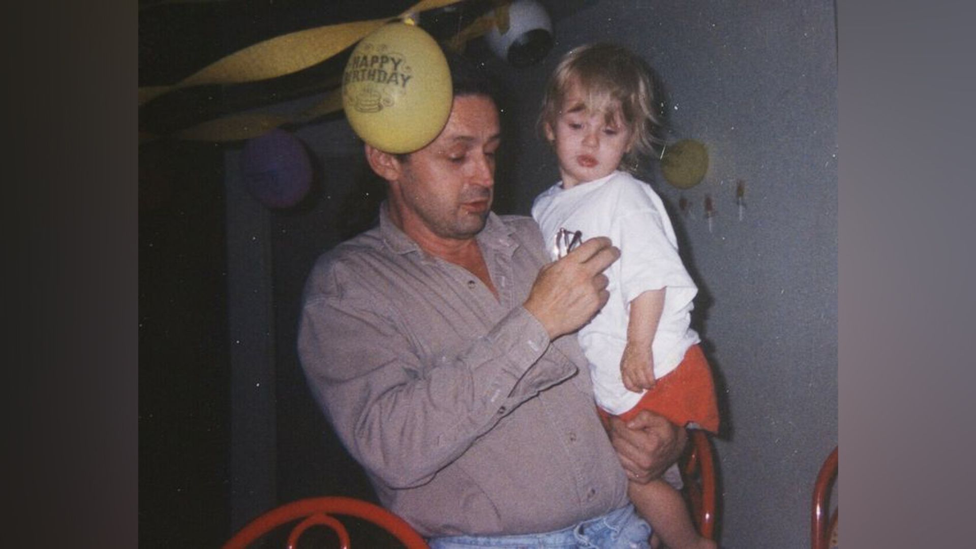 Macaulay Culkin as a child with his father