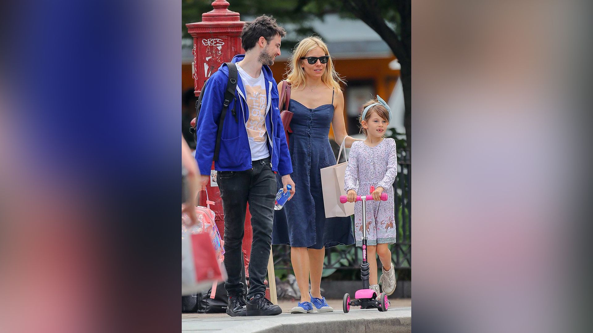 Tom Sturridge and Sienna Miller with their daughter