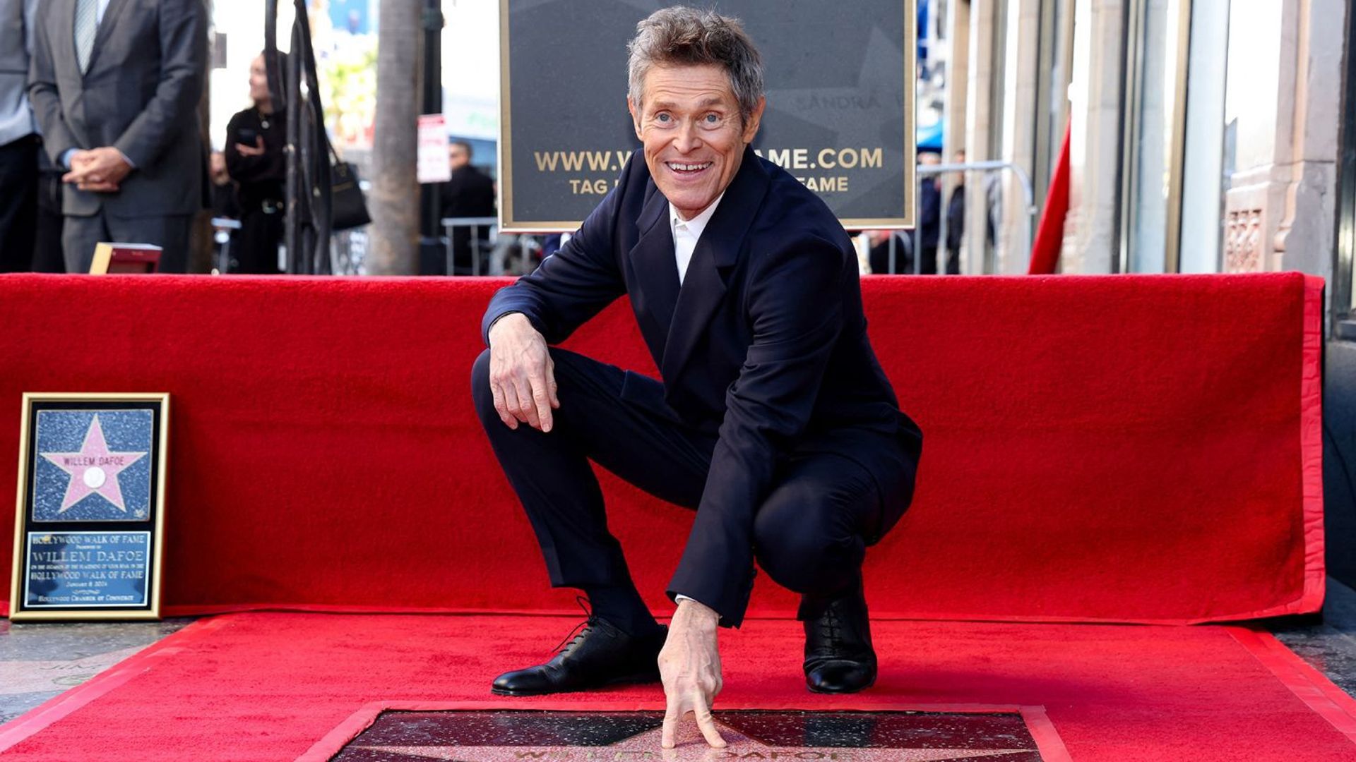 Willem Dafoe and his star on the Walk of Fame