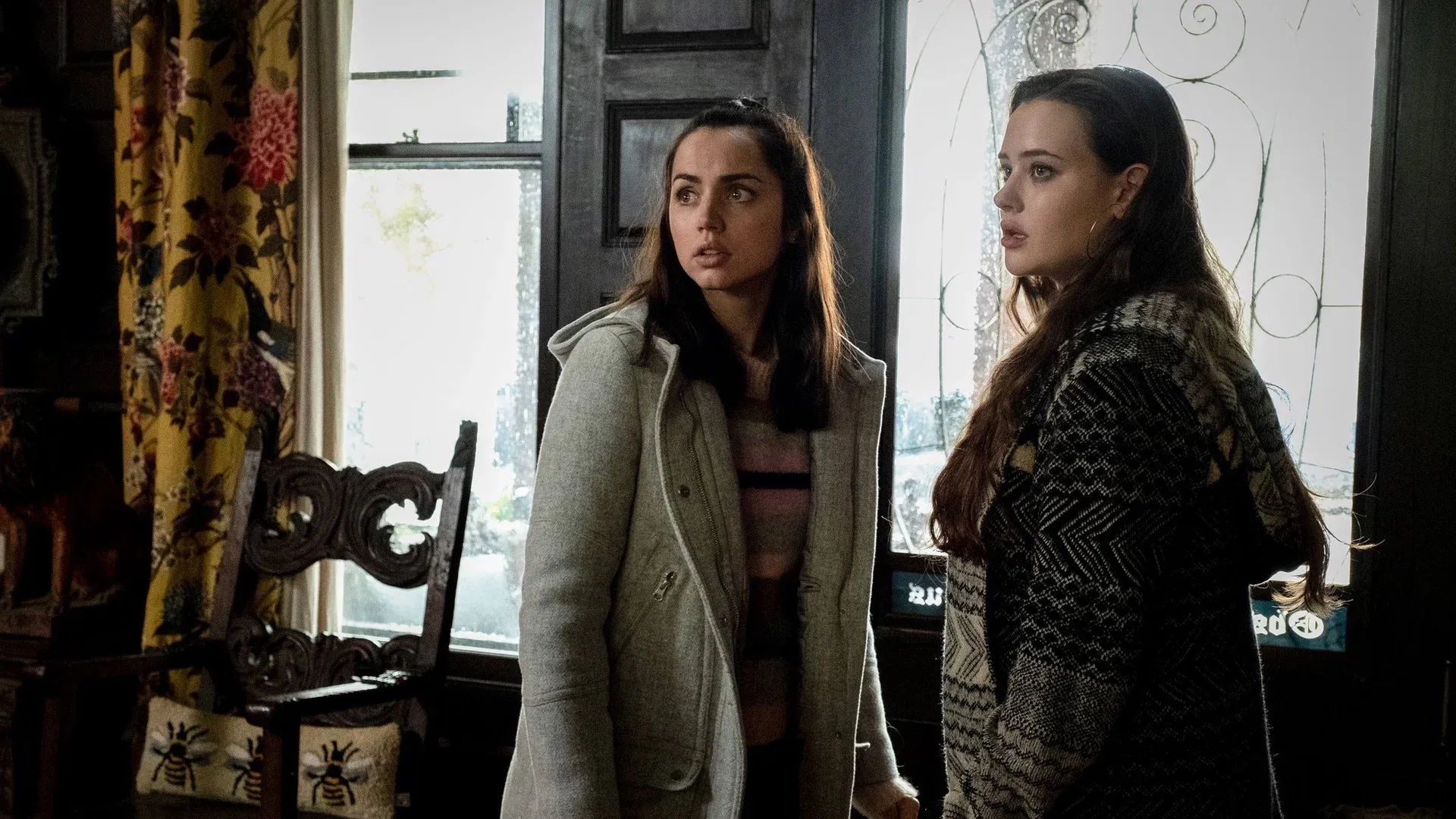 Katherine Langford and Ana de Armas in the movie 'Knives Out'