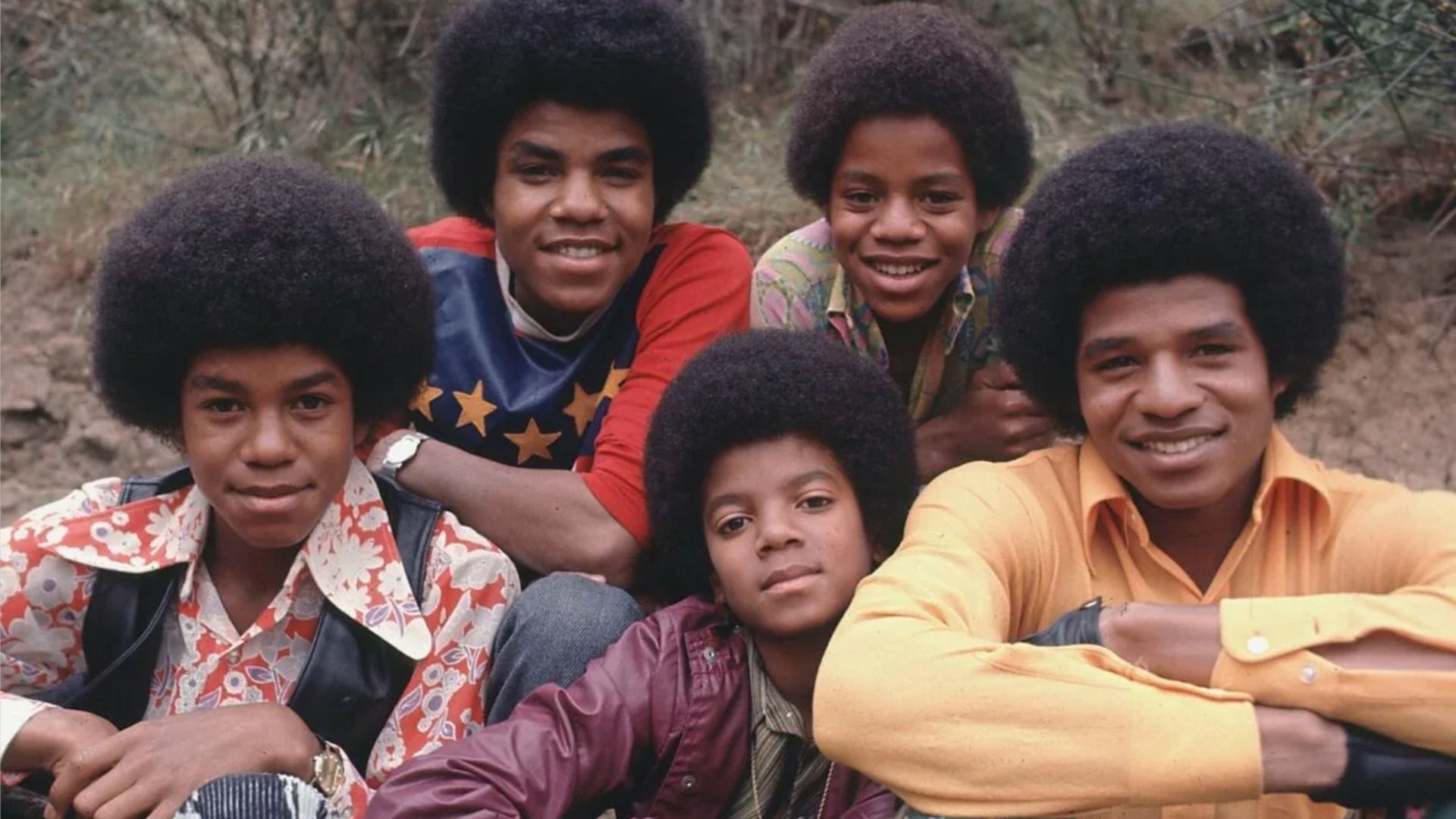 Tito and Michael Jackson with their brothers