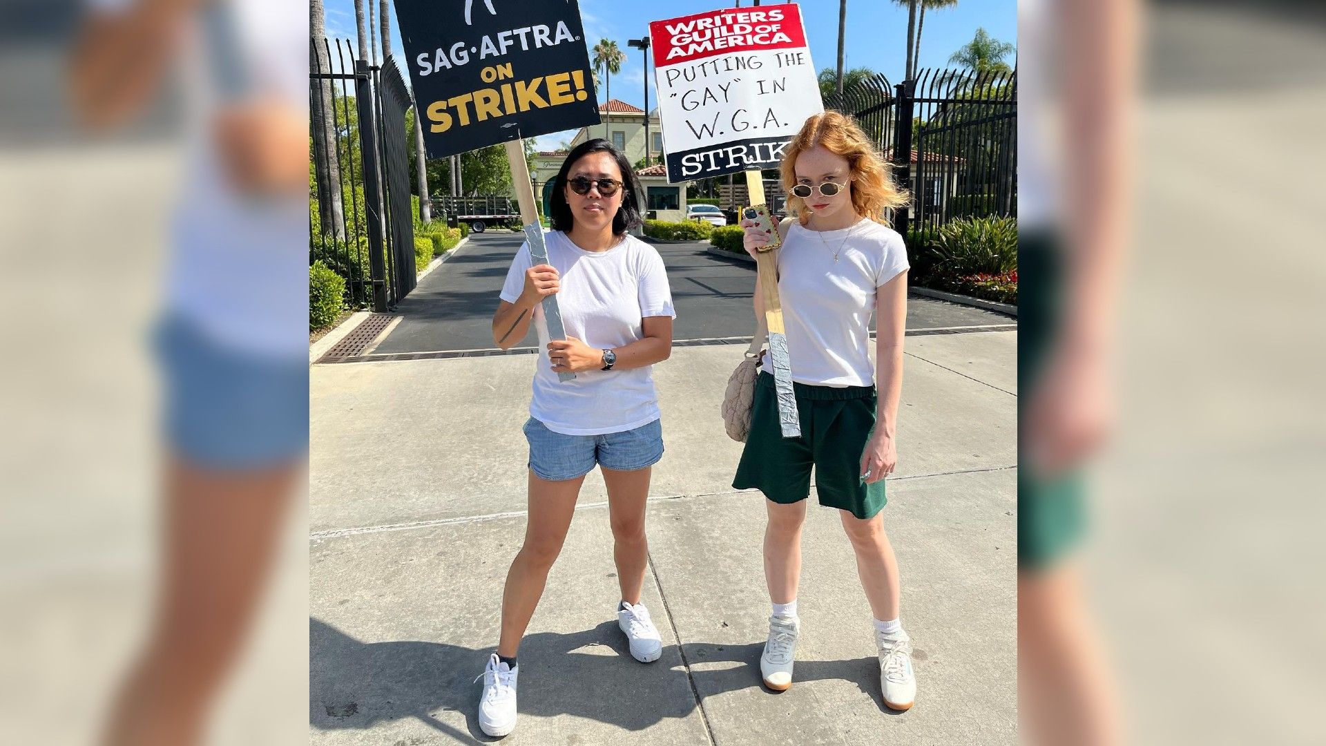Suzanna Son and Ada Bedayo at the writers' strike holding signs