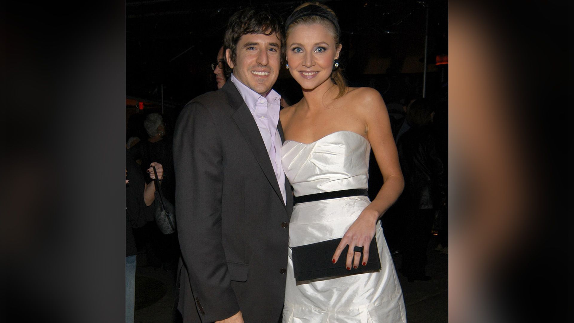 Sarah Chalke in a white dress and Jamie Afifi in a blazer