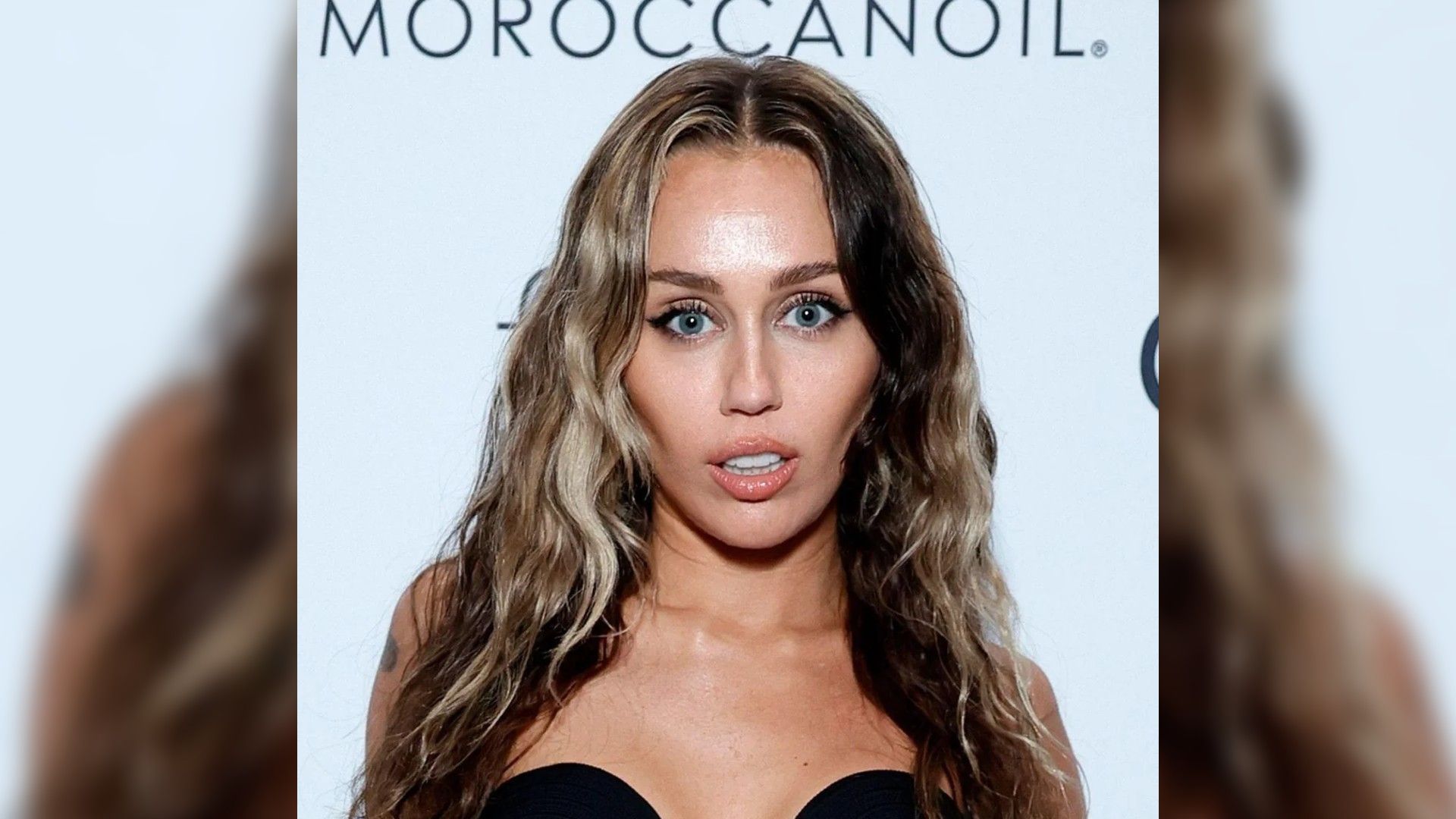 Miley Cyrus, close-up face, long hair