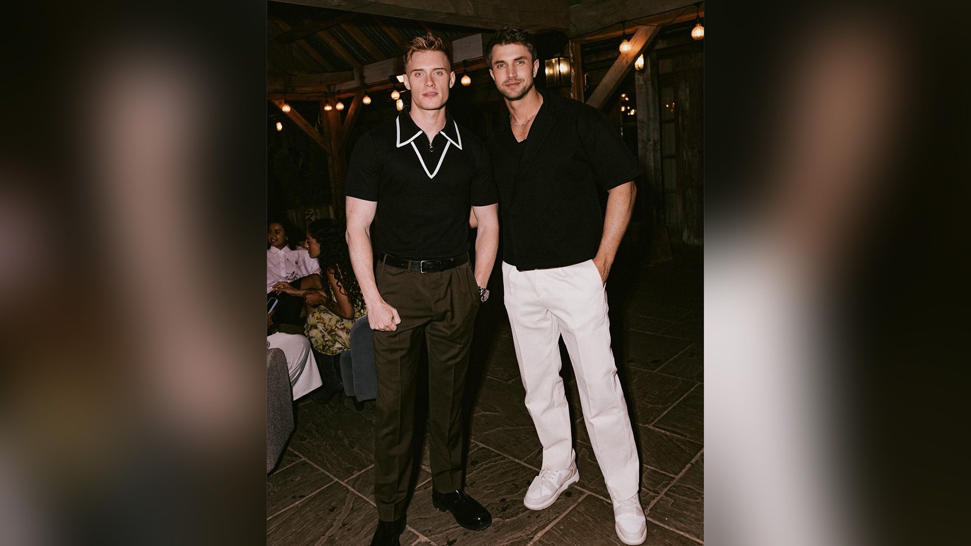 Max Parker and Kris Mochrie pose for a photo at a party