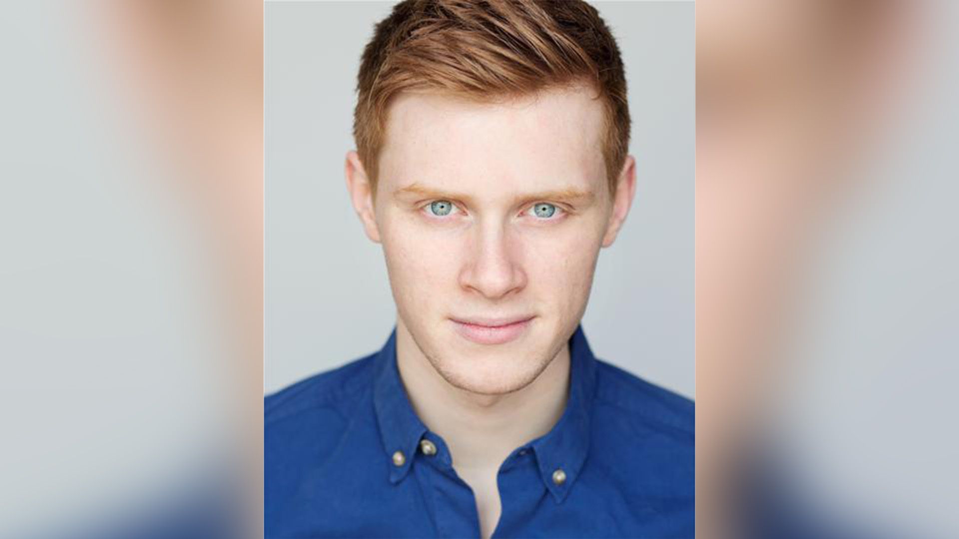 Young Max Parker in a blue shirt