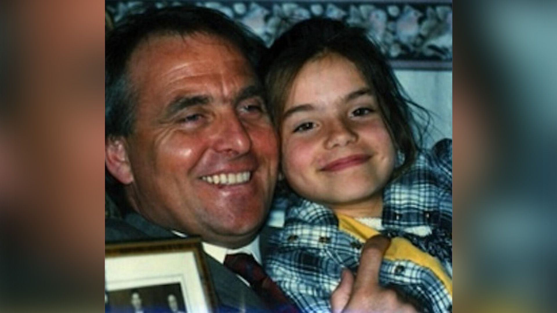 Charlotte Riley as a child in her father's arms