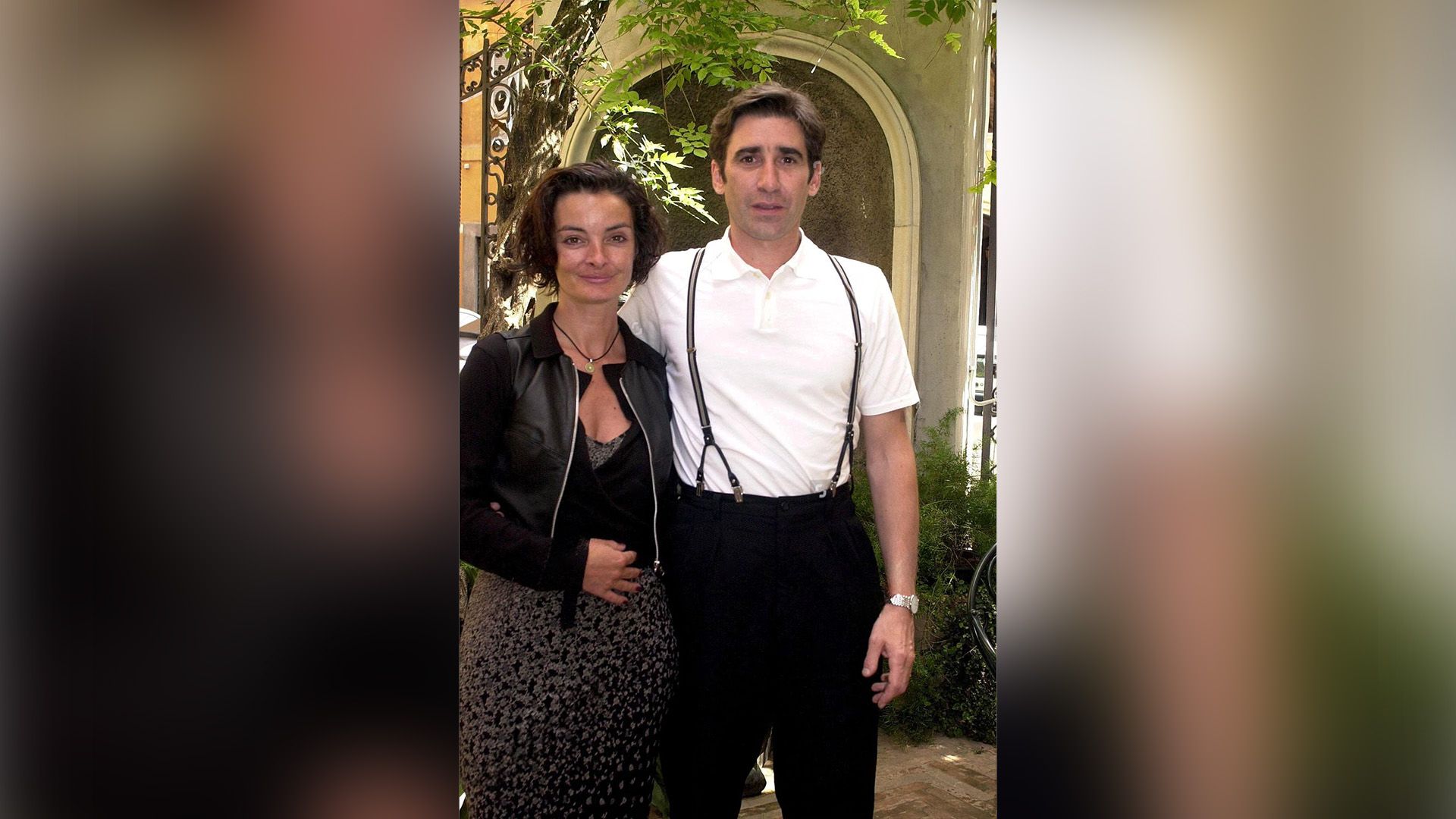 Mary McGuckian in a black dress and John Lynch in a white shirt and suspenders