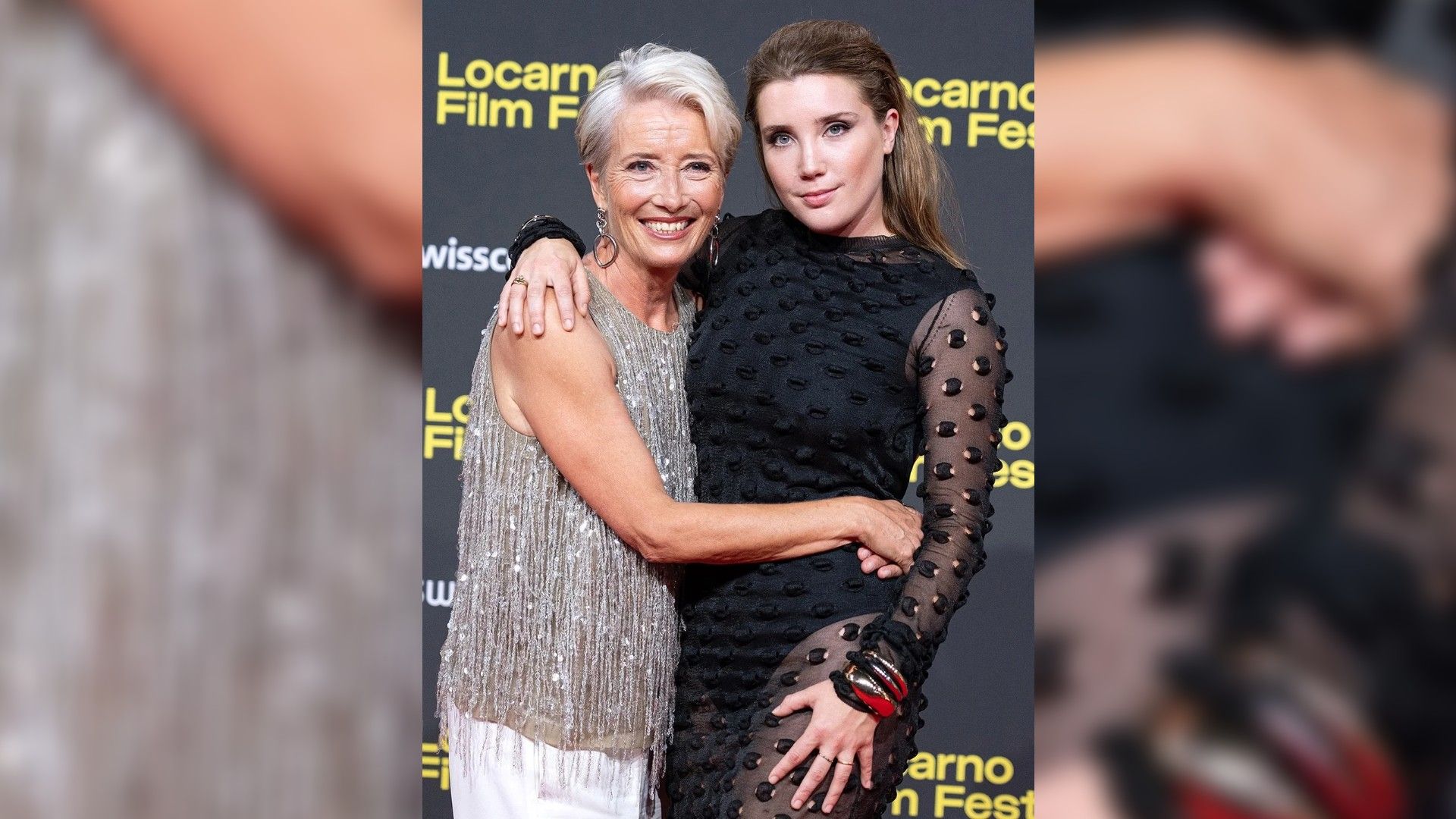Emma Thompson hugs her daughter on the red carpet of the film festival