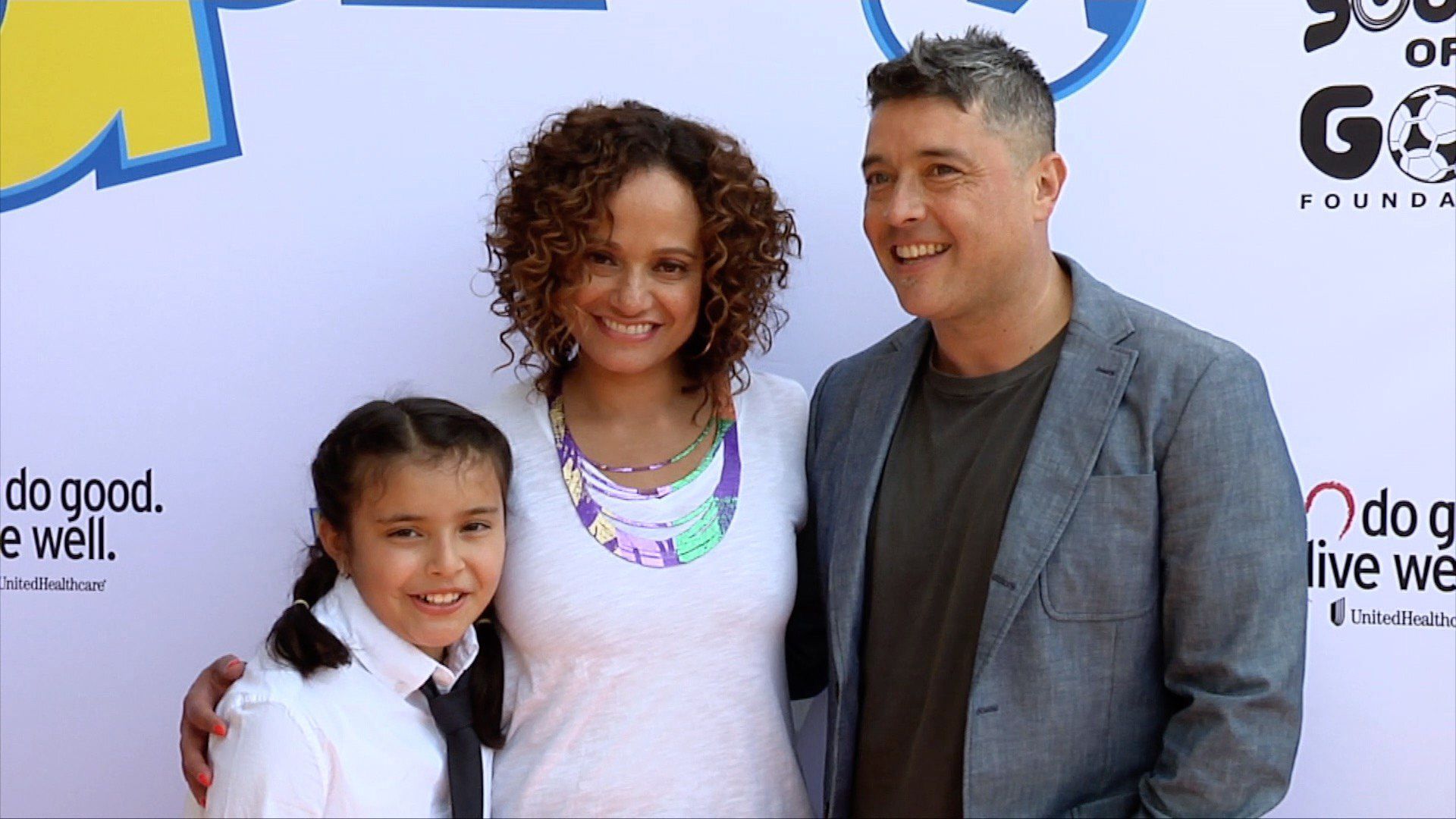 Judy Reyes, her husband George Valencia and their daughter Leila Rey Valencia at a social event