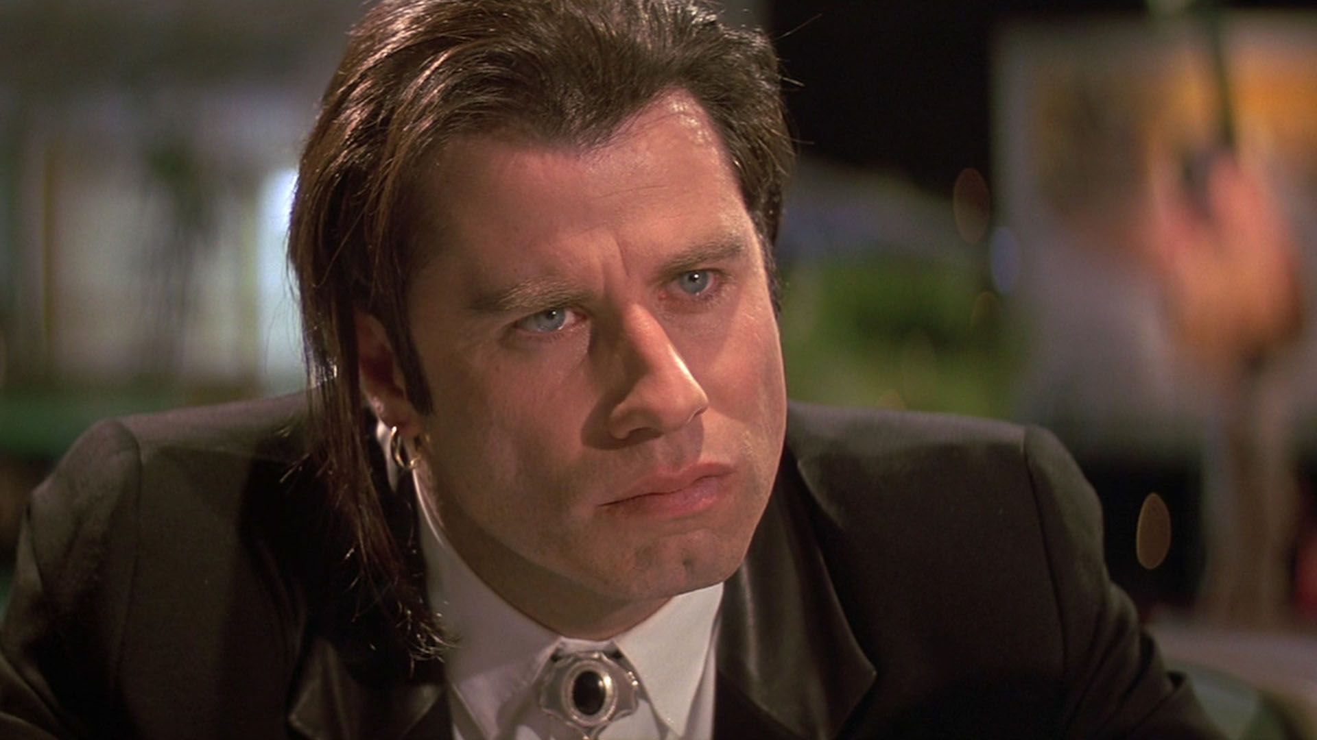 John Travolta as Vincent Vega in the movie "Pulp Fiction"