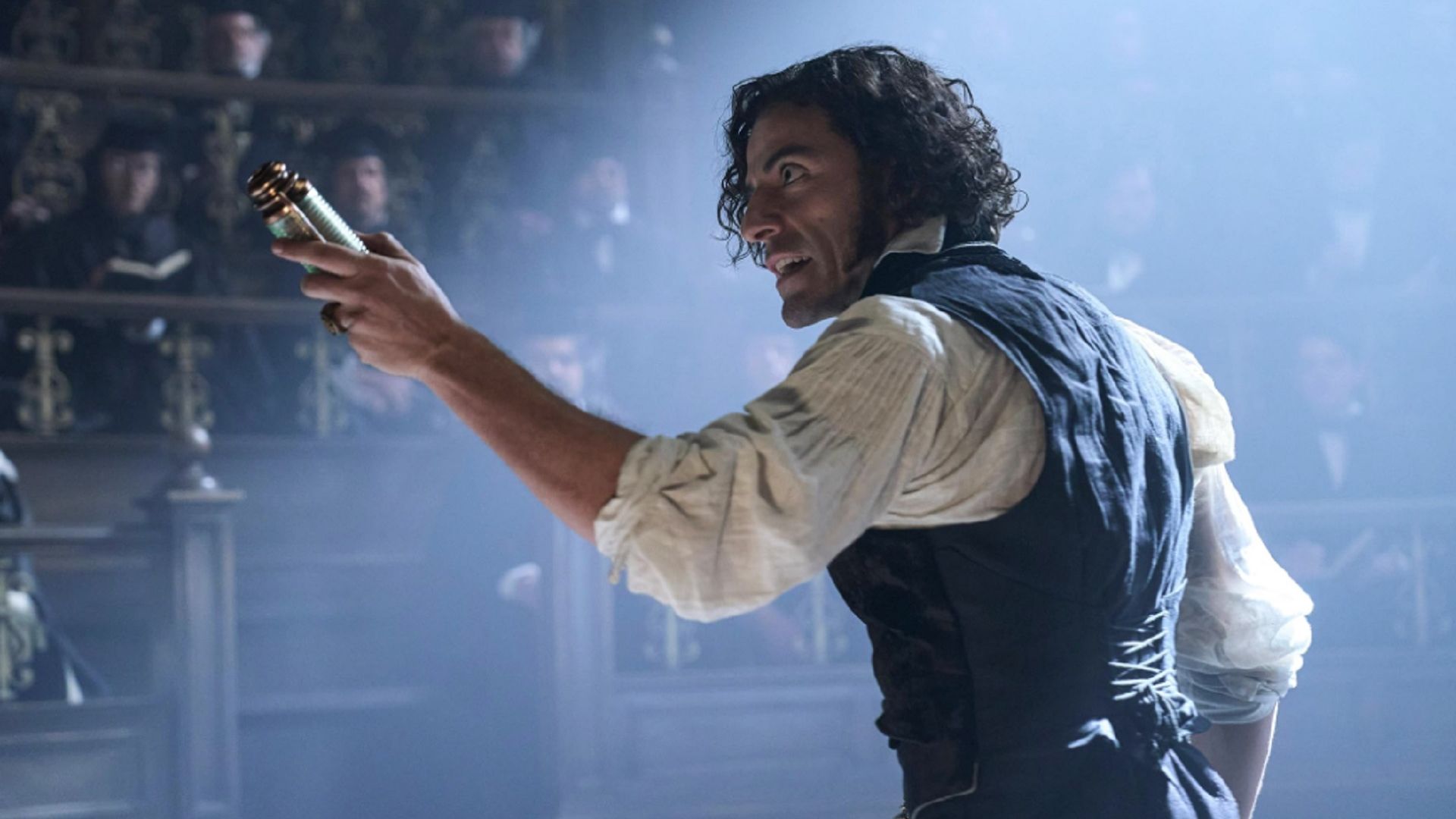 Oscar Isaac as Victor Frankenstein proving his theory to scientists