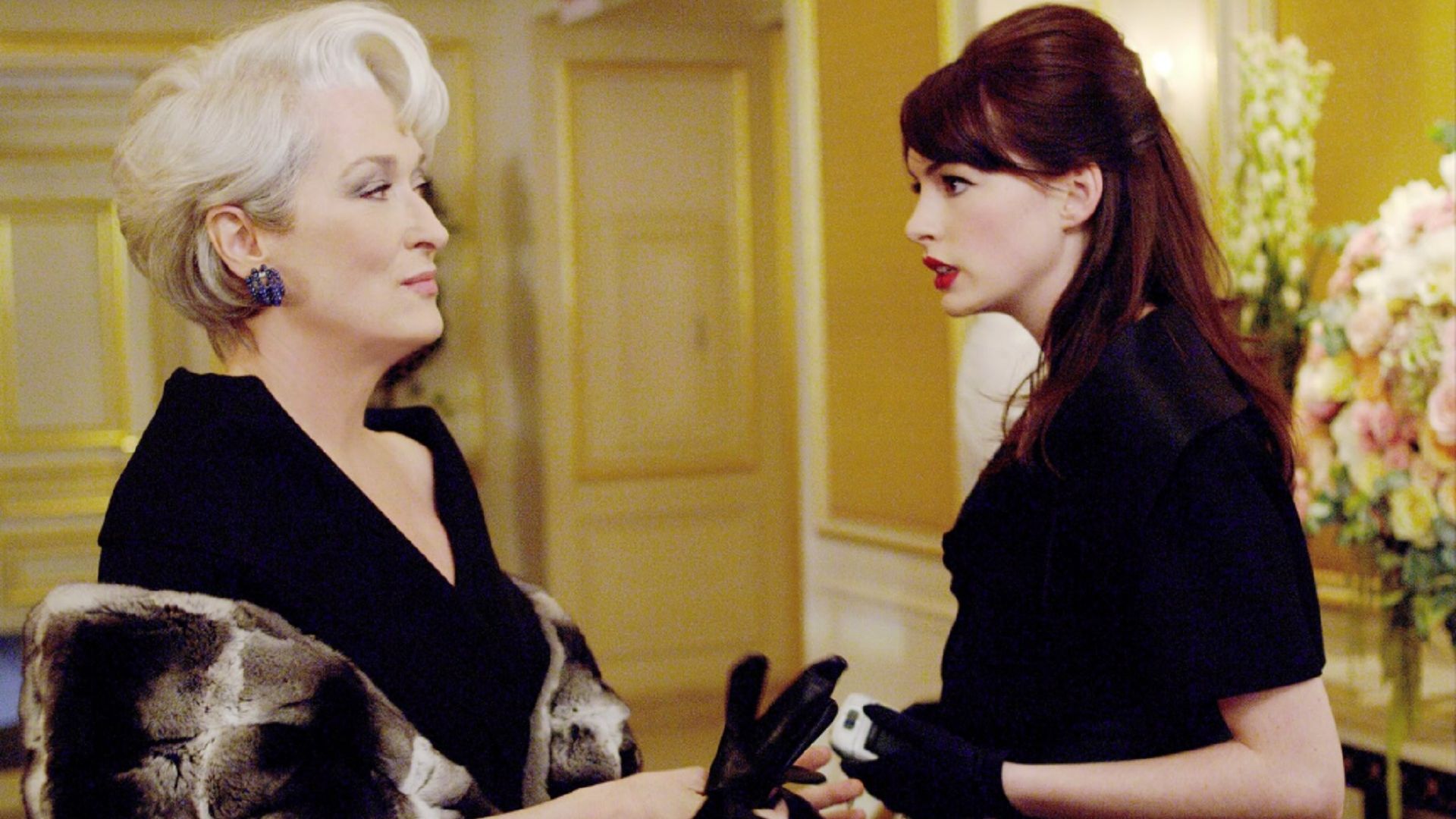 The characters of Meryl Streep and Anne Hathaway look at each other, sorting out their relationship