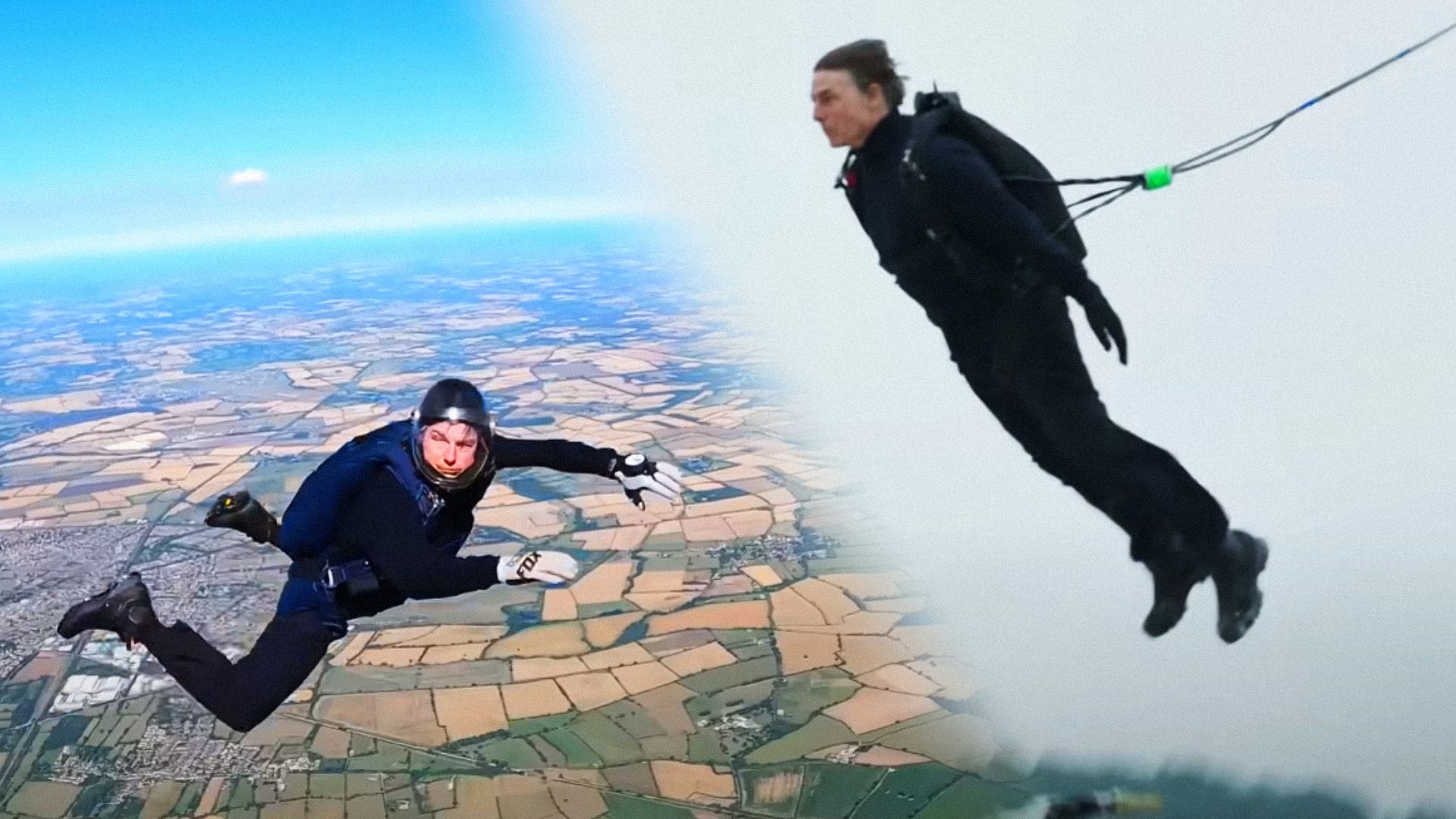 Tom Cruise in a black suit and helmet during a skydiving jump looks at the camera against the backdrop of the sky