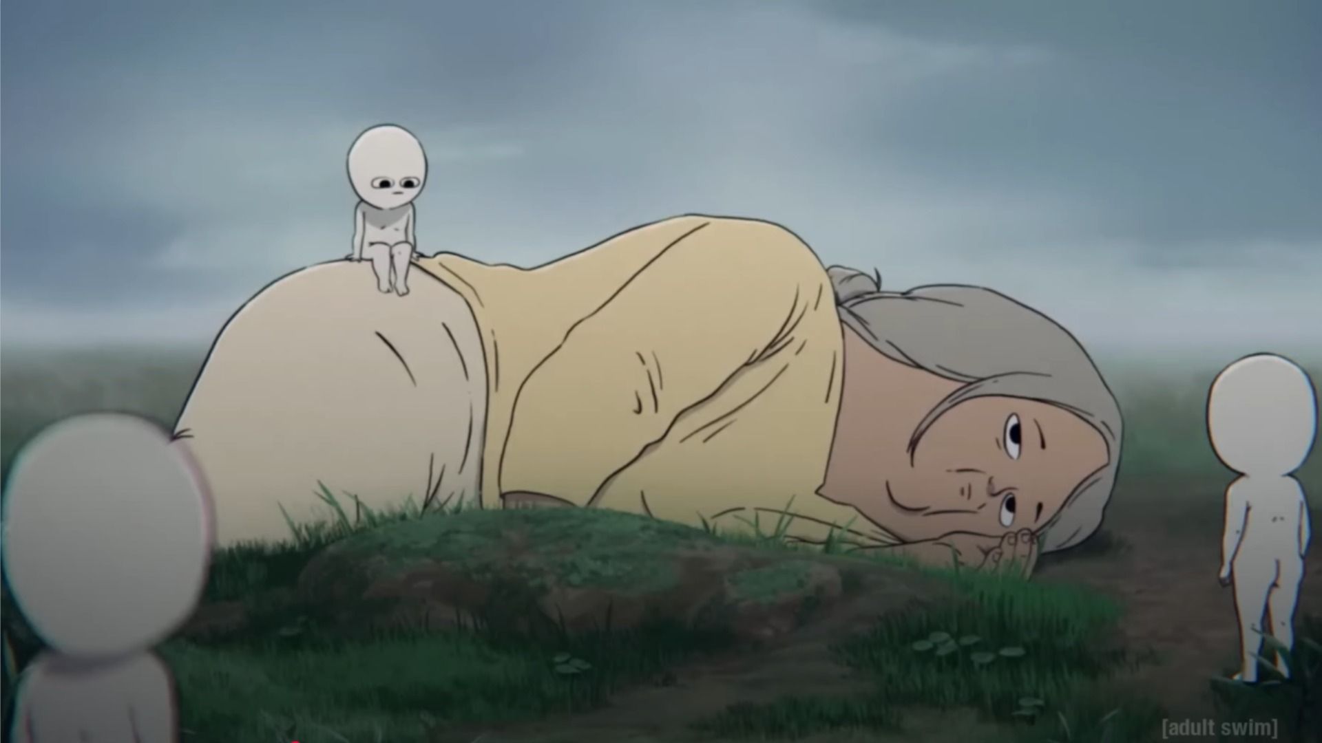A woman in yellow clothing lies on the ground surrounded by little white figures