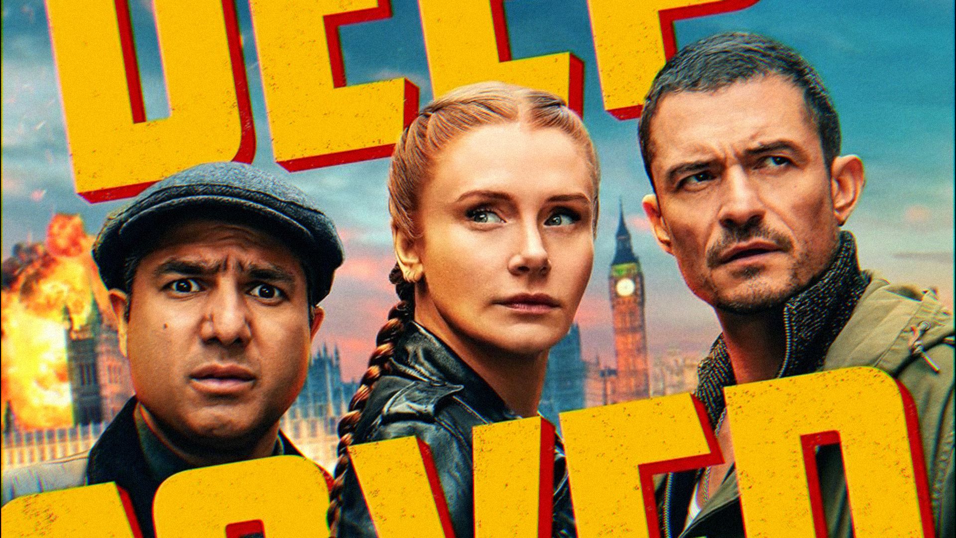 Actors Bryce Dallas Howard, Orlando Bloom and Nick Mohammed look in different directions with serious faces