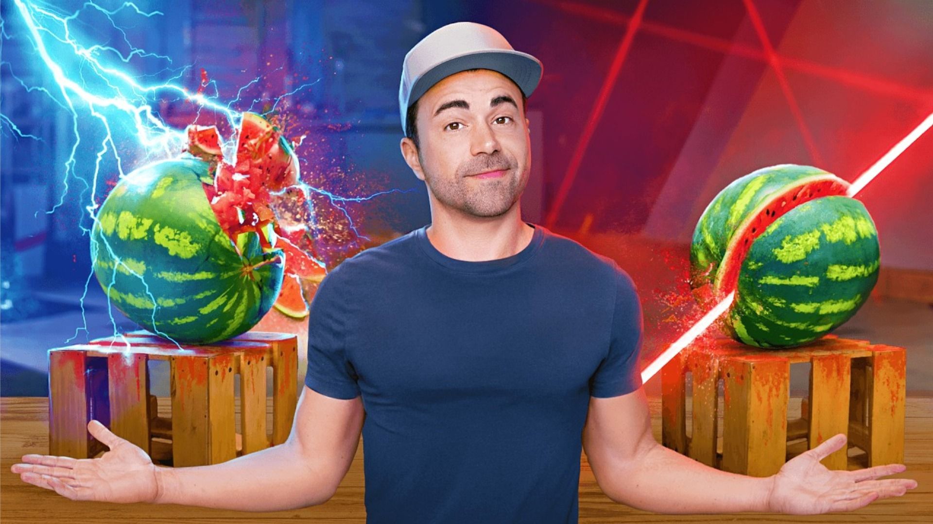 Blogger Mark Rober in a blue t-shirt and cap next to two watermelons