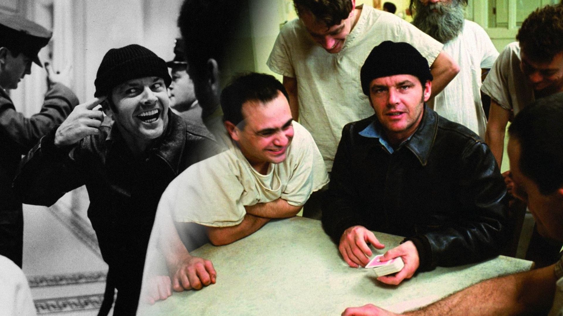 Actor Jack Nicholson in a black hat sits with cards and smiles