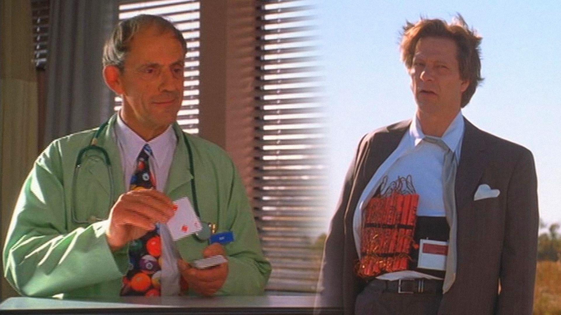 Actor Christopher Lloyd in a robe with cards in his hands, actor Chris Cooper in a jacket with explosives