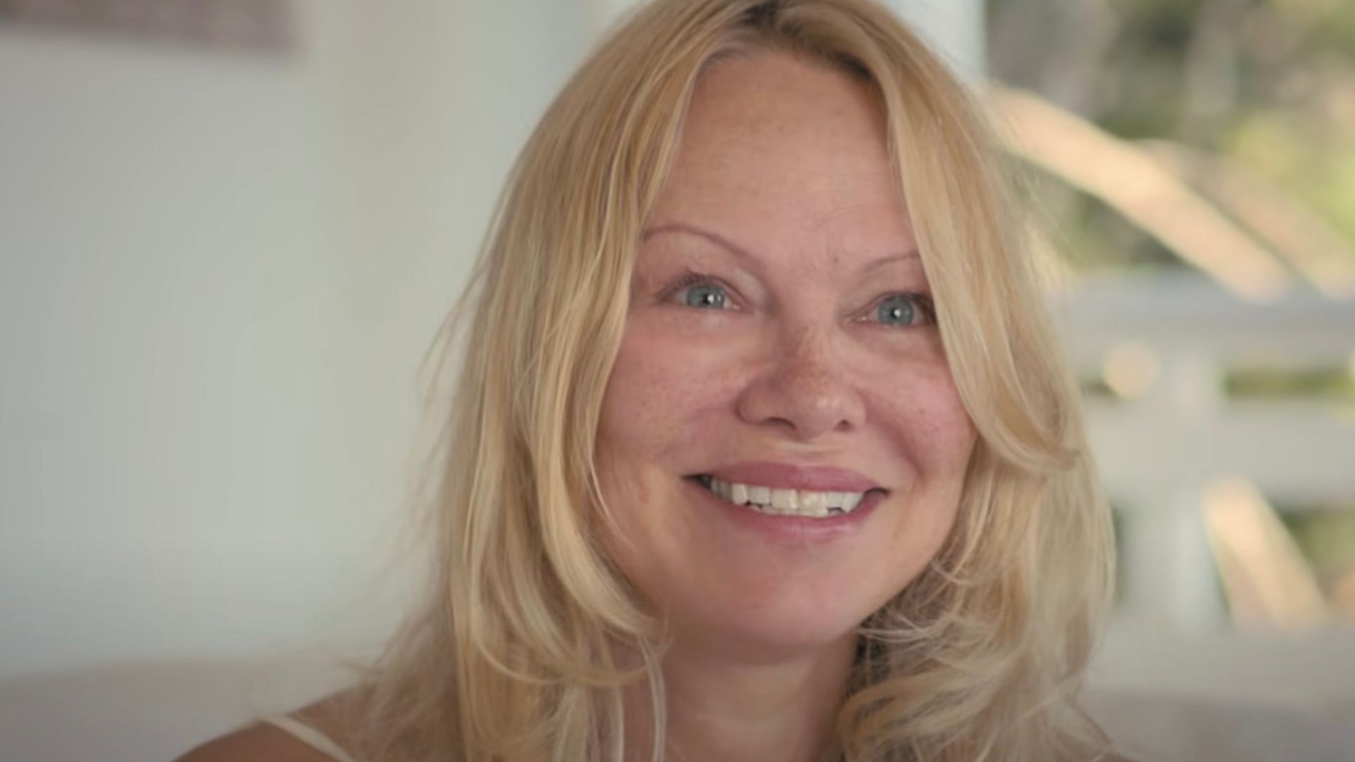 Close-up of Pamela Anderson's face without makeup