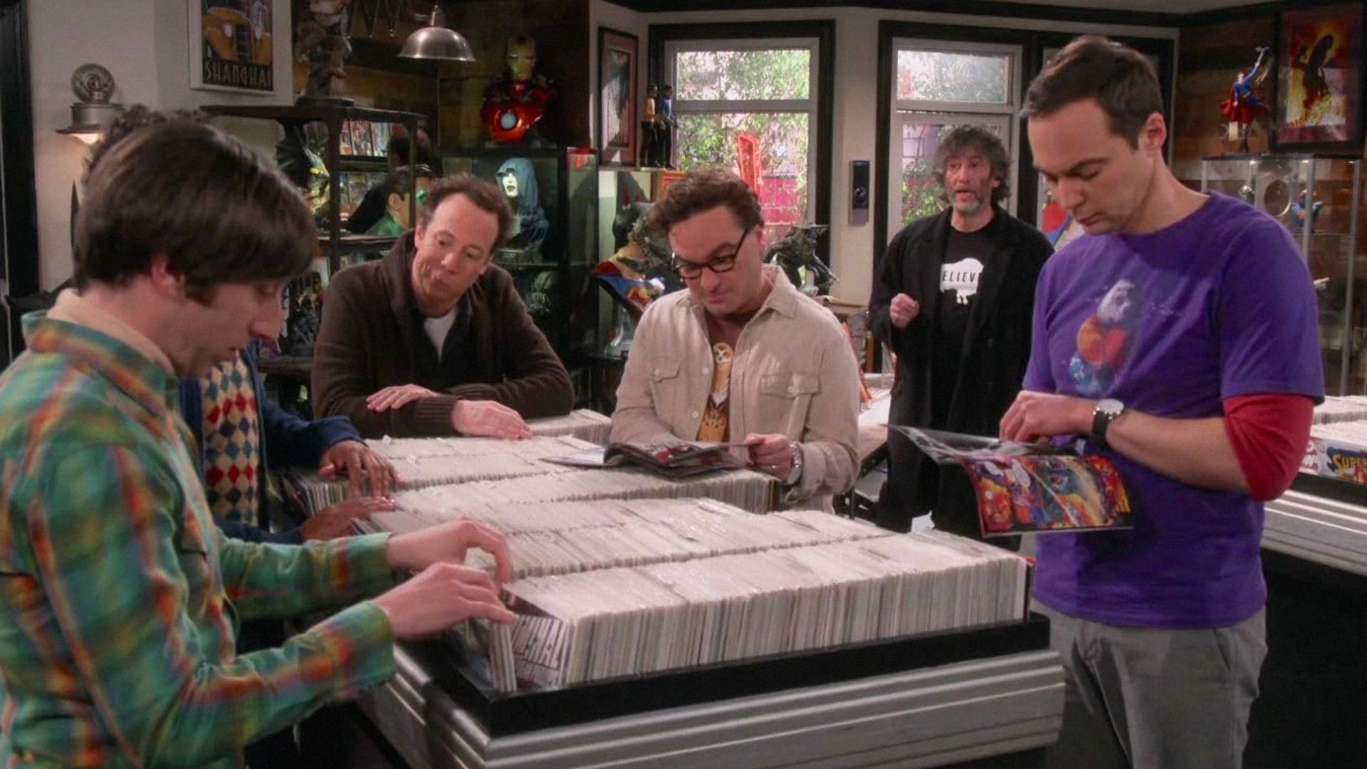 Actors Kevin Sussman and Jim Parsons are standing in a comic book store looking at comics