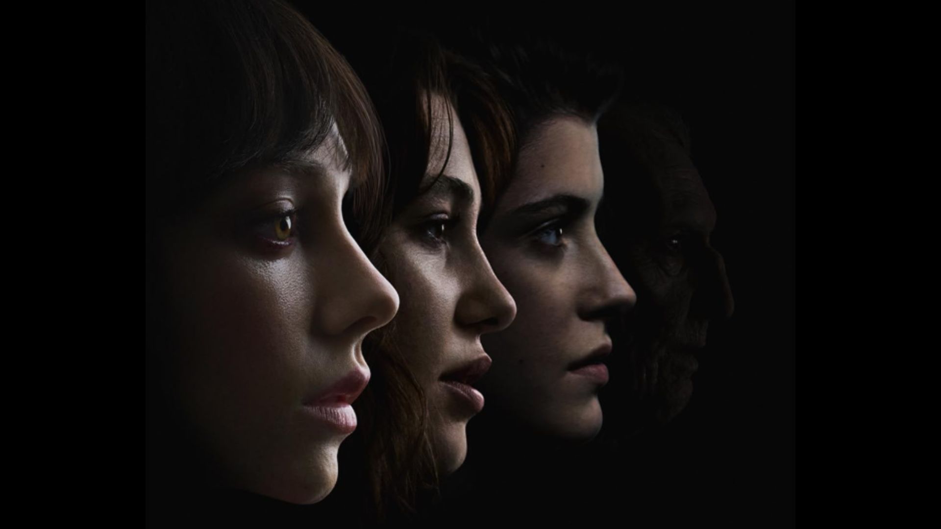 Three girls and an old man stand one behind the other and look to the side against a black background