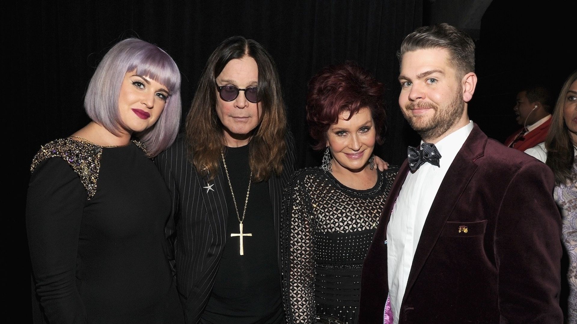 Ozzy Osbourne with his wife and children