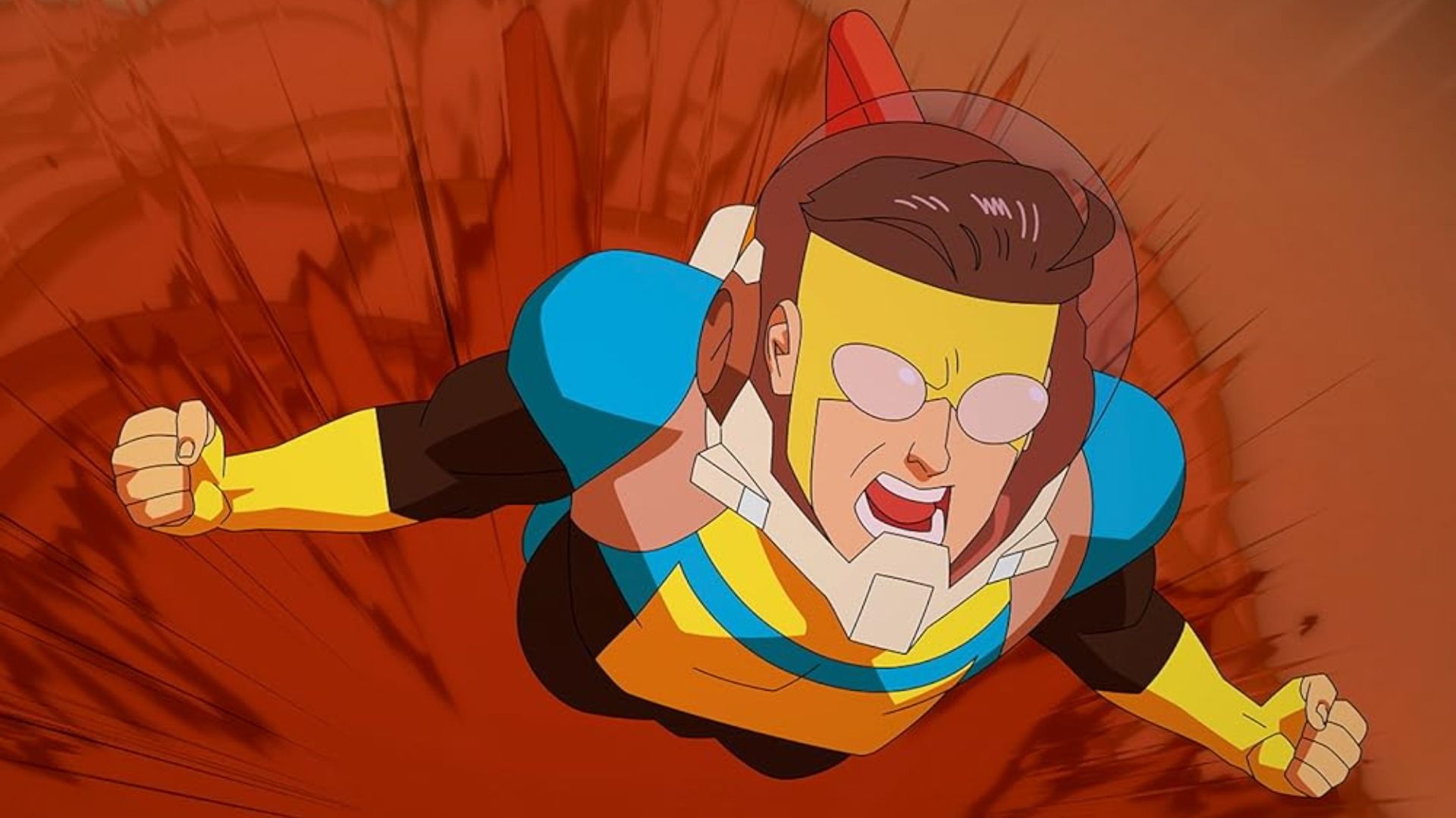 A guy in a blue and yellow superhero costume with white goggles is flying and screaming