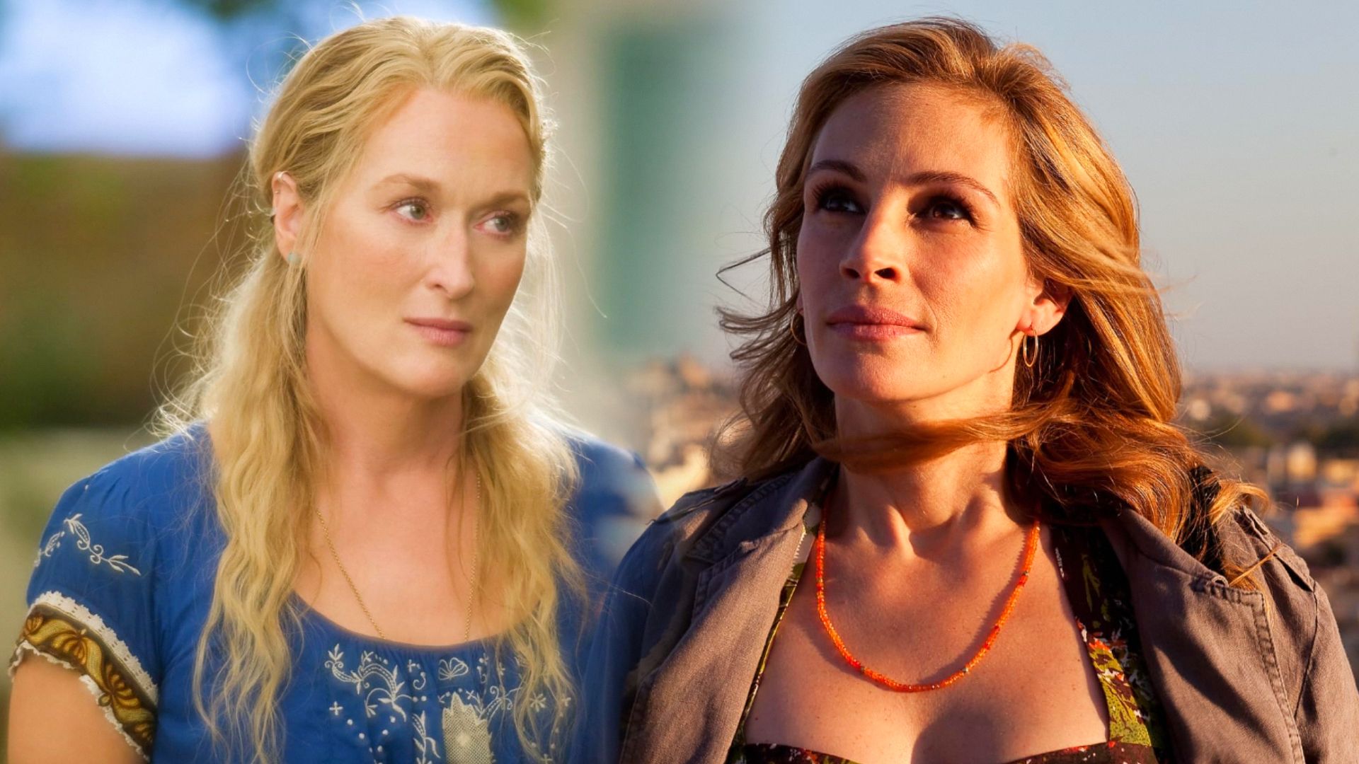 Actress Meryl Streep in a blue dress and actress Julia Roberts in a gray jacket under sunlight