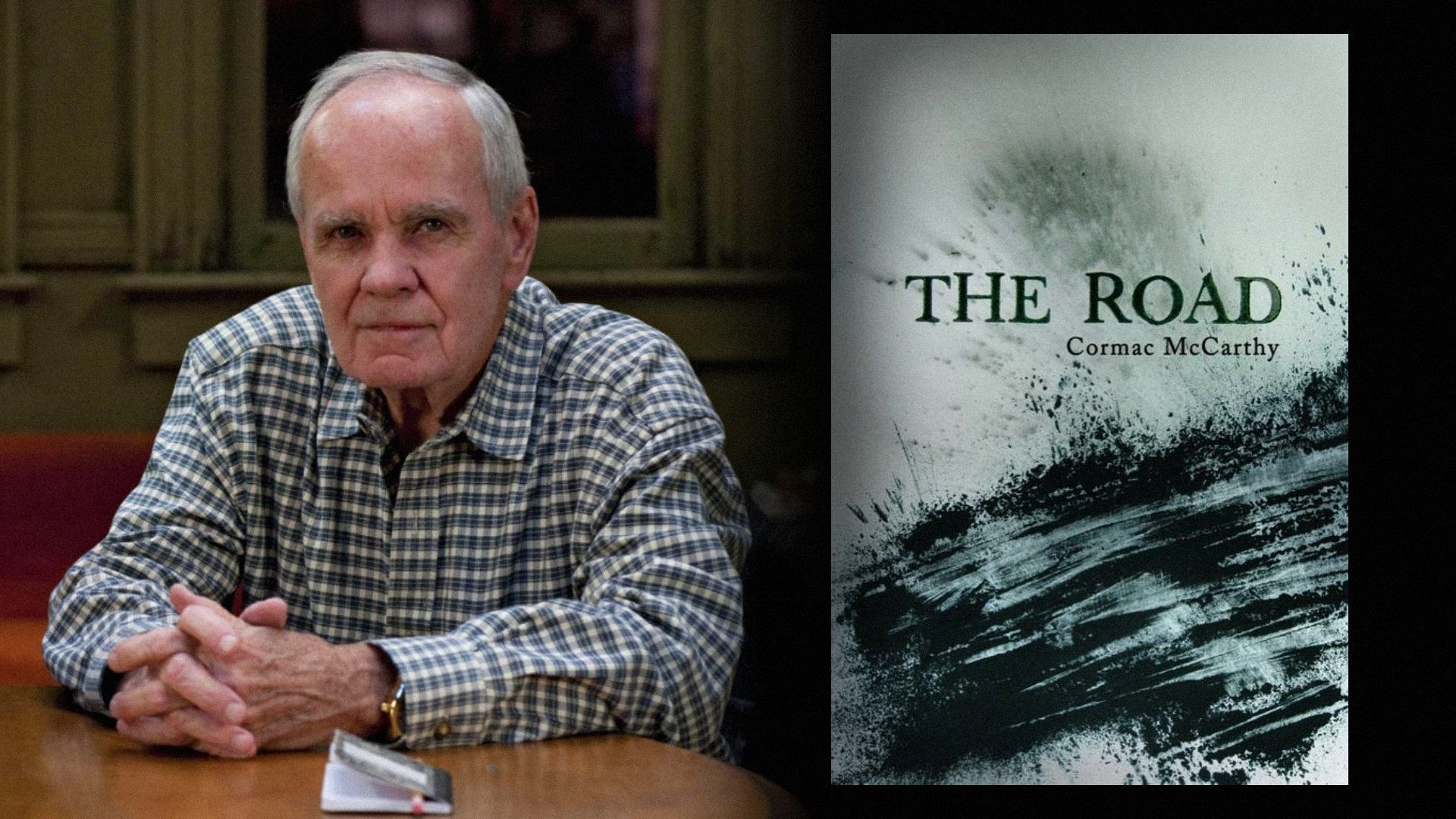 Writer Cormac McCarthy in a checkered shirt sits at a table, next to a book cover with black ink blots on it