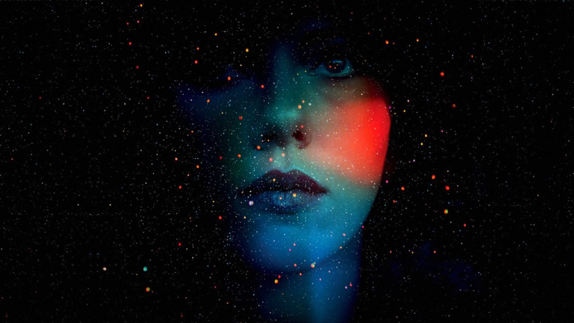 Actress Scarlett Johansson's face against a black starry background