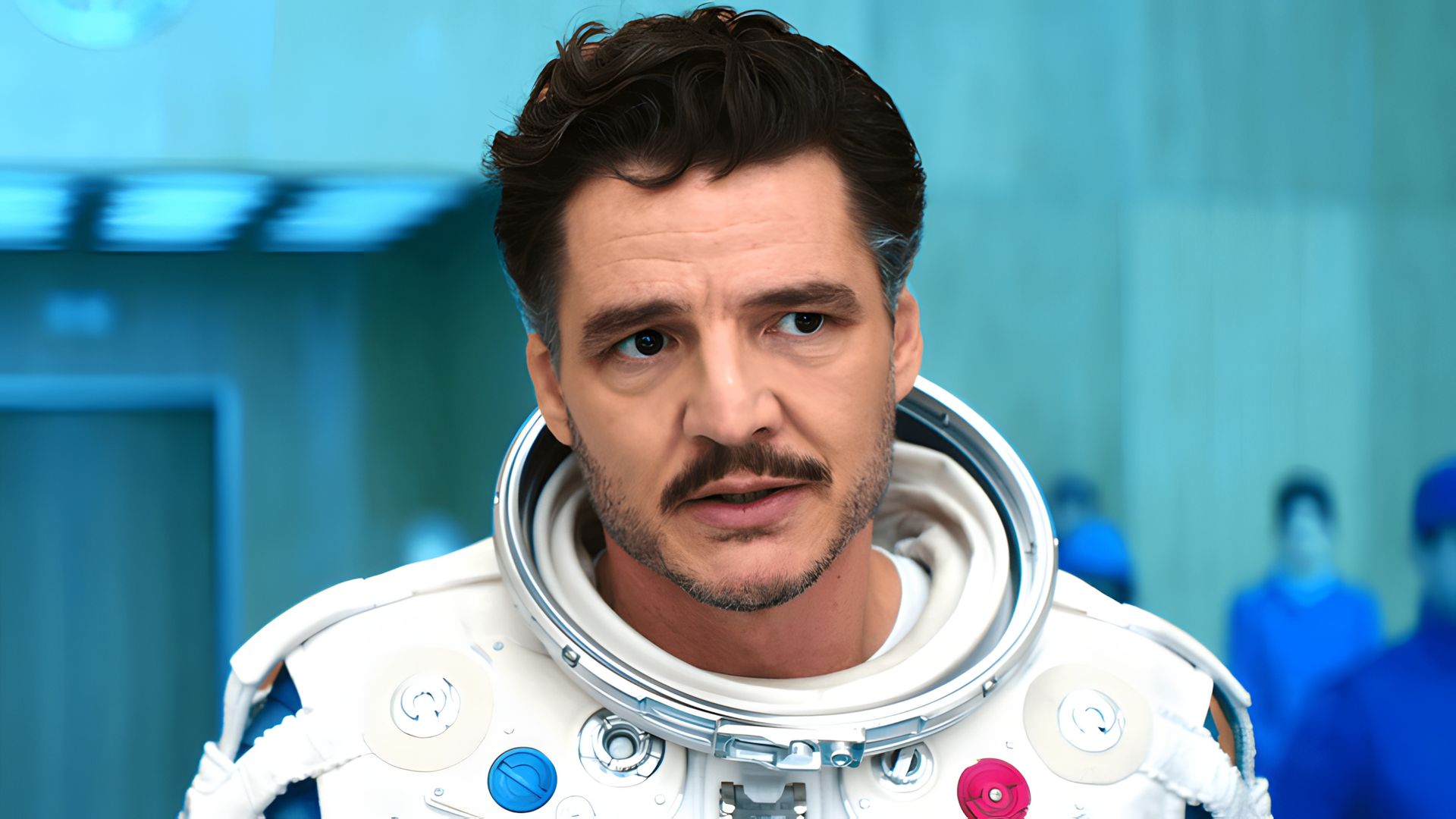 Pedro Pascal in astronaut suit without helmet