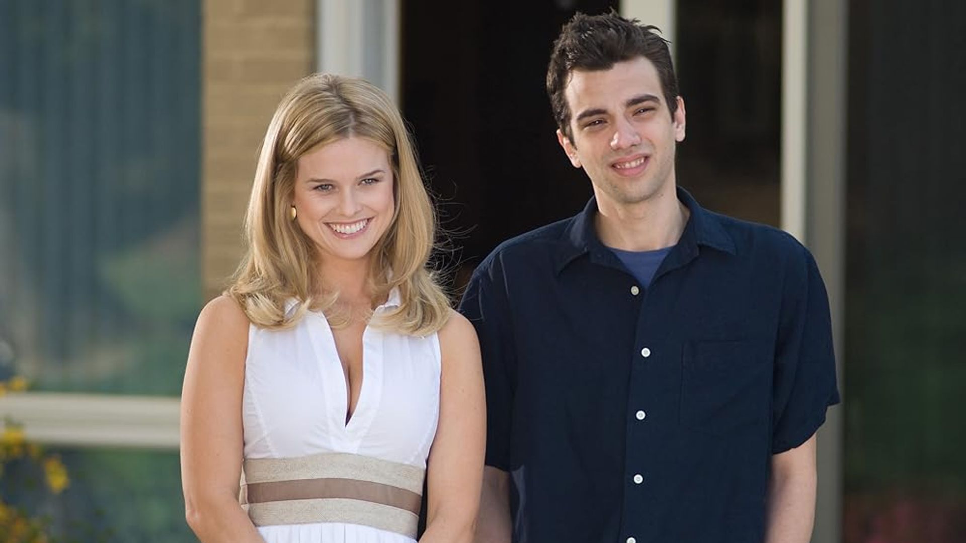 Jay Baruchel and Alice Eve standing next to each other on the street, a scene from the film