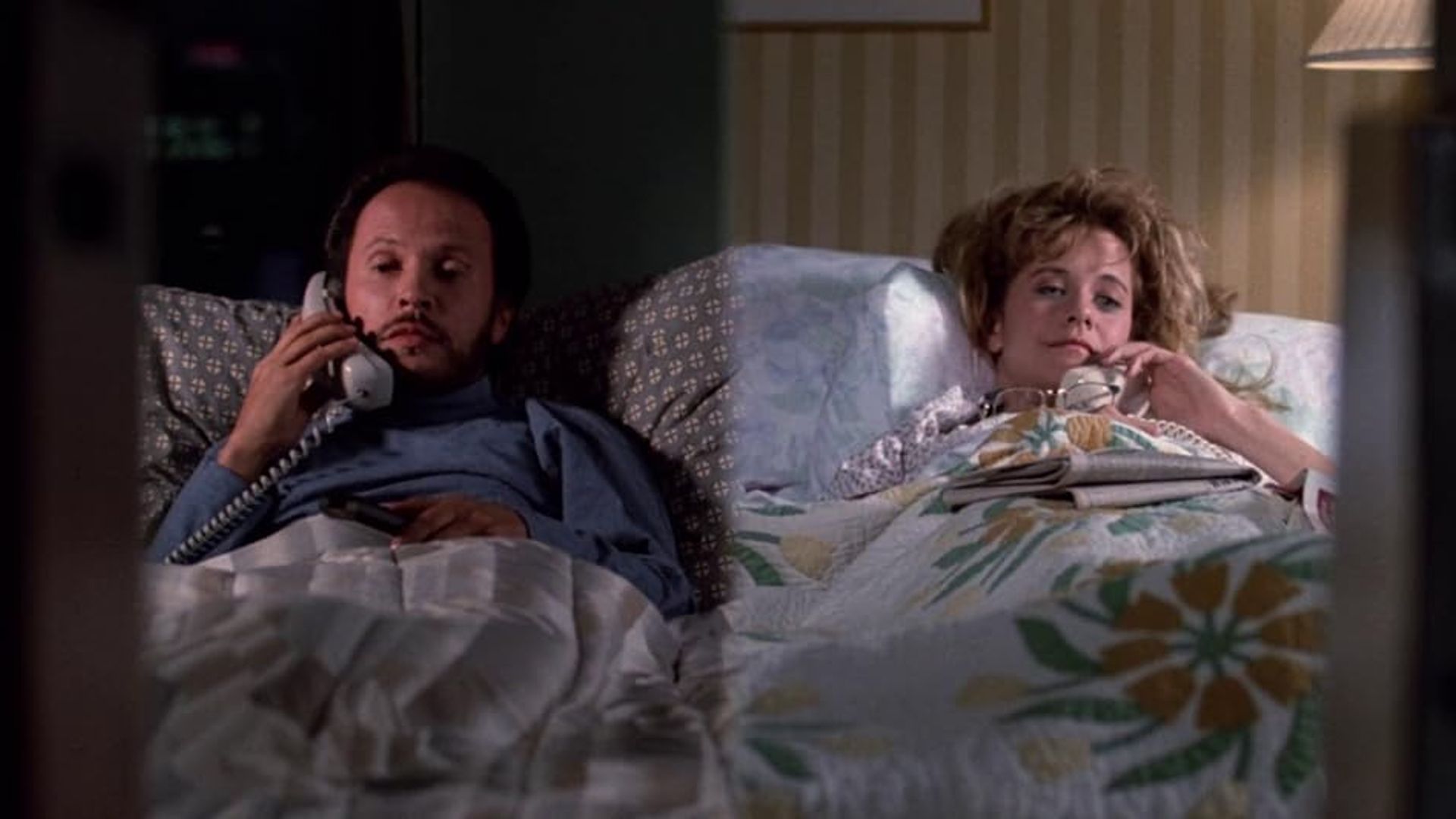 Meg Ryan and Billy Crystal each lying in their own bed talking on the phone