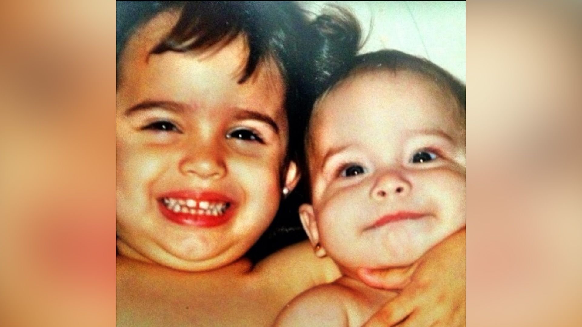 Sofia Carson with younger sister Paulina in childhood
