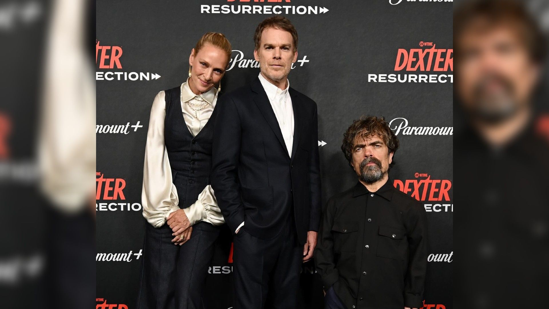 Uma Thurman, Michael Hall and Peter Dinklage pose at the premiere of "Dexter: Resurrection" against a Paramount+ banner backdrop