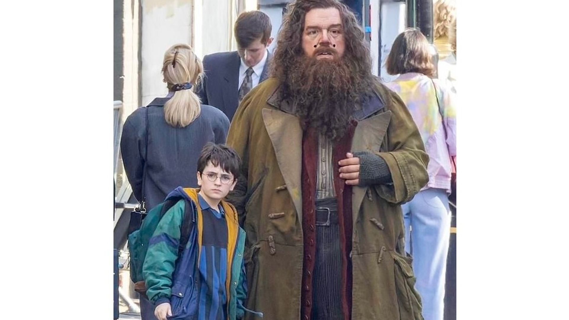 Nick Frost and Dominic McLaughlin as Hagrid and Harry Potter