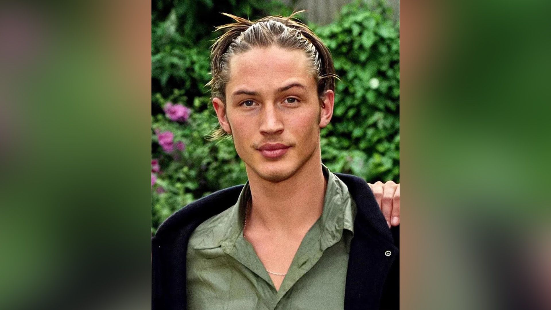 Young Tom Hardy in a green shirt