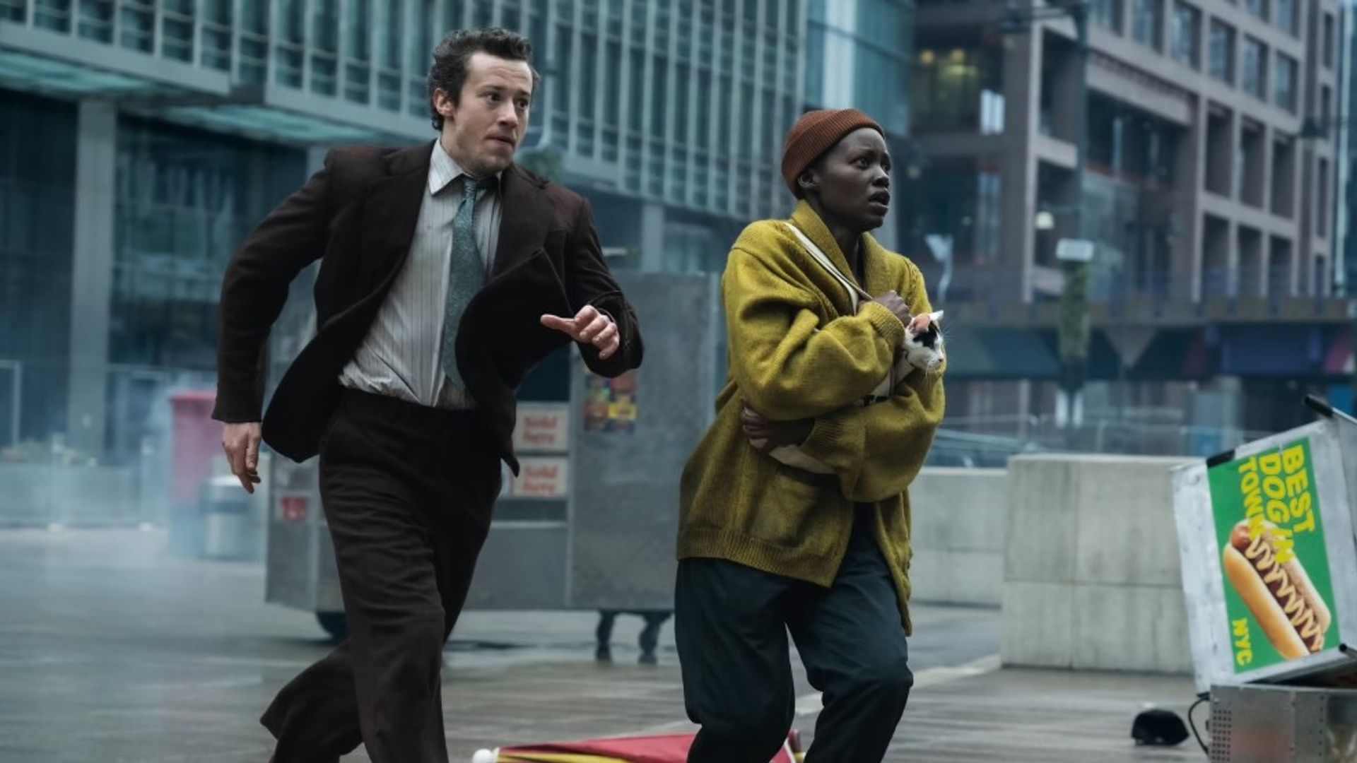 Joseph Quinn and Lupita Nyong'o running through New York, a scene from the film "A Quiet Place: Day One"