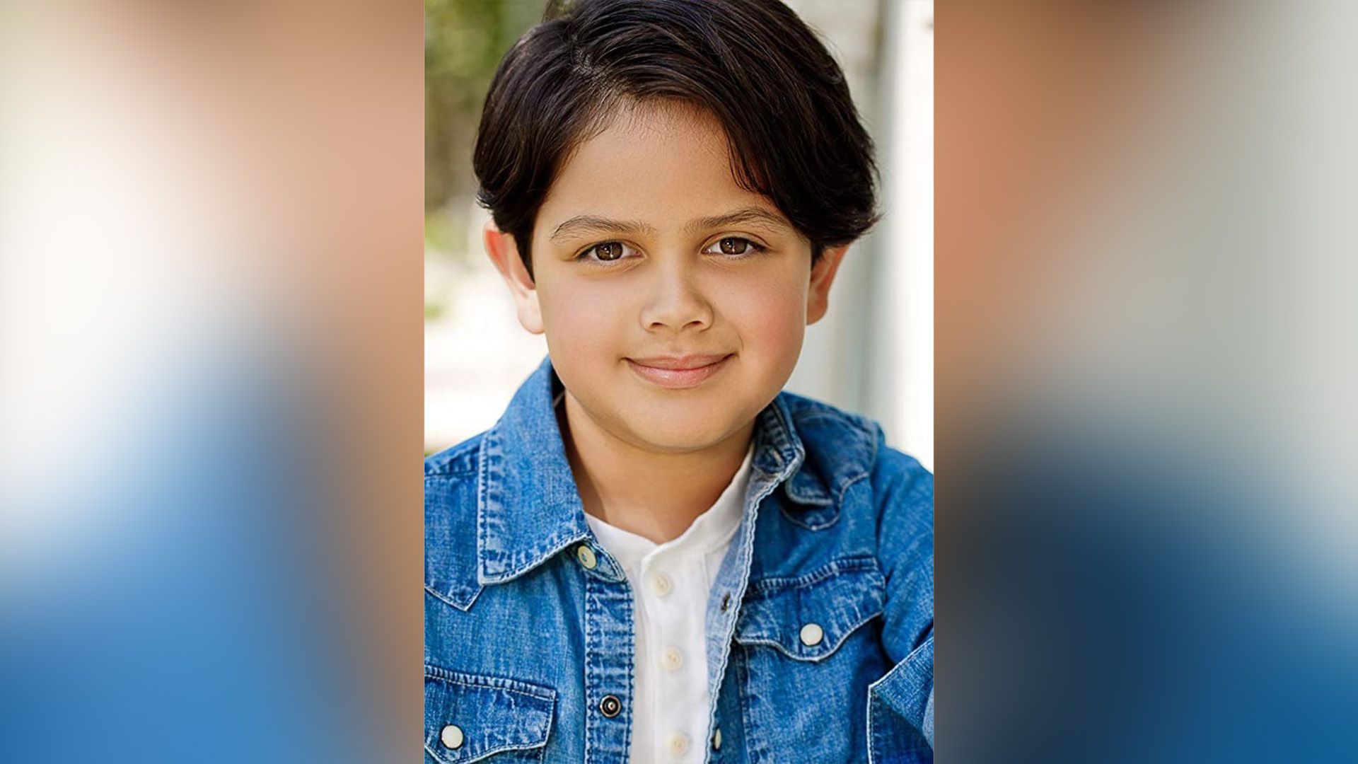 Isaac Ordonez as a child in a denim jacket and white polo shirt