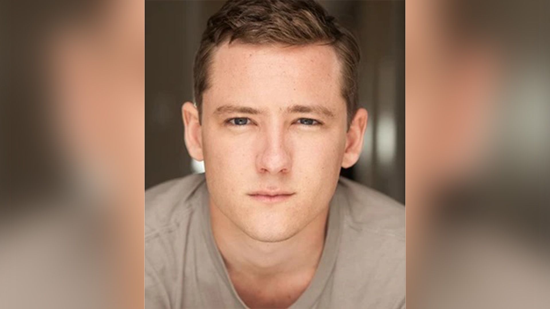 Young actor Lewis Pullman in a beige t-shirt close-up
