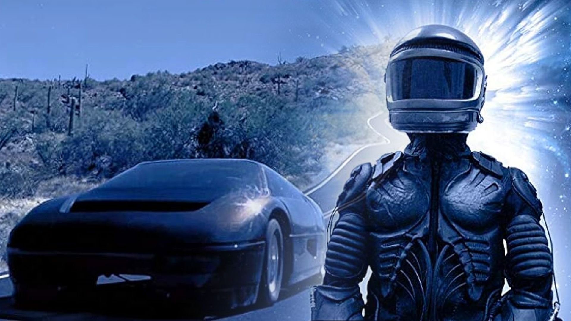 A man in a black suit and helmet standing on the road next to a black car