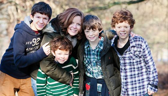 Tom Holland with his brothers and mother